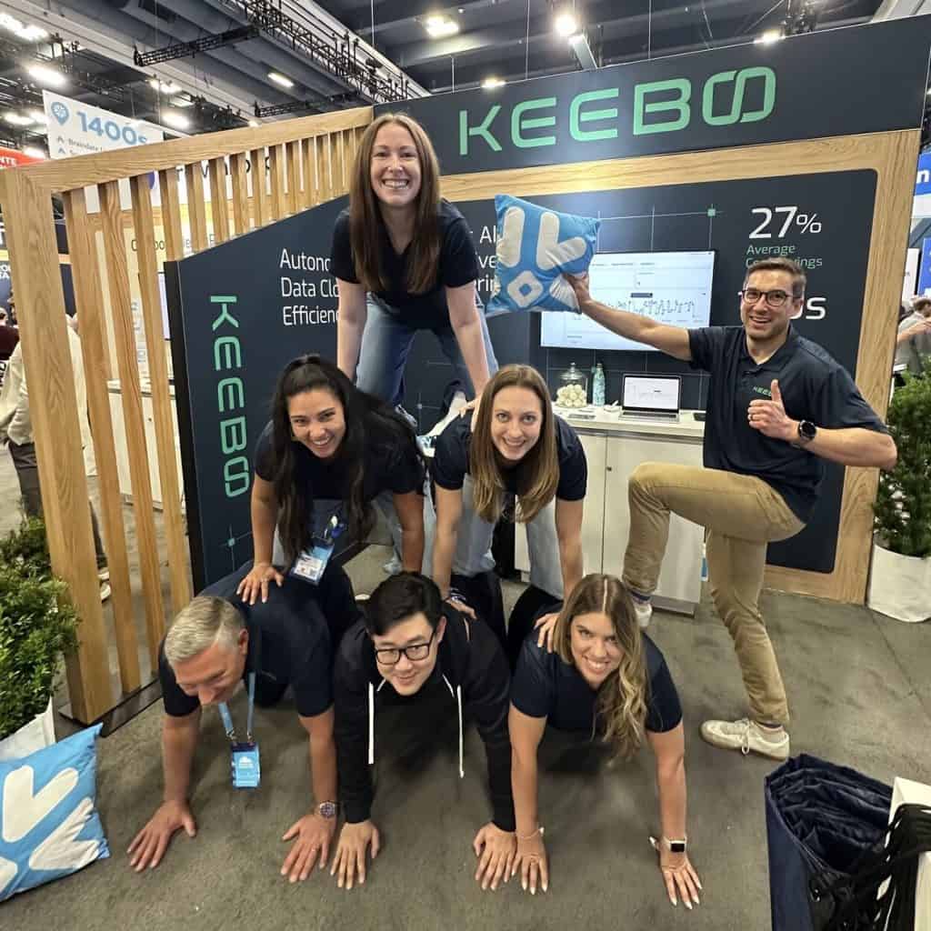 Keebo | Careers Keebo team building a mountain for a Snowflake Summit photo contest